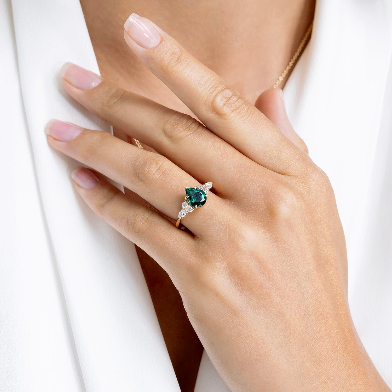 Pear Shape Emerald Side Stone Engagement Ring with Diamonds