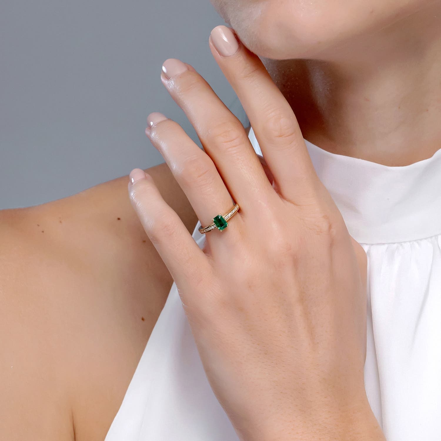 Octagonal Emerald Engagement Ring with Diamonds