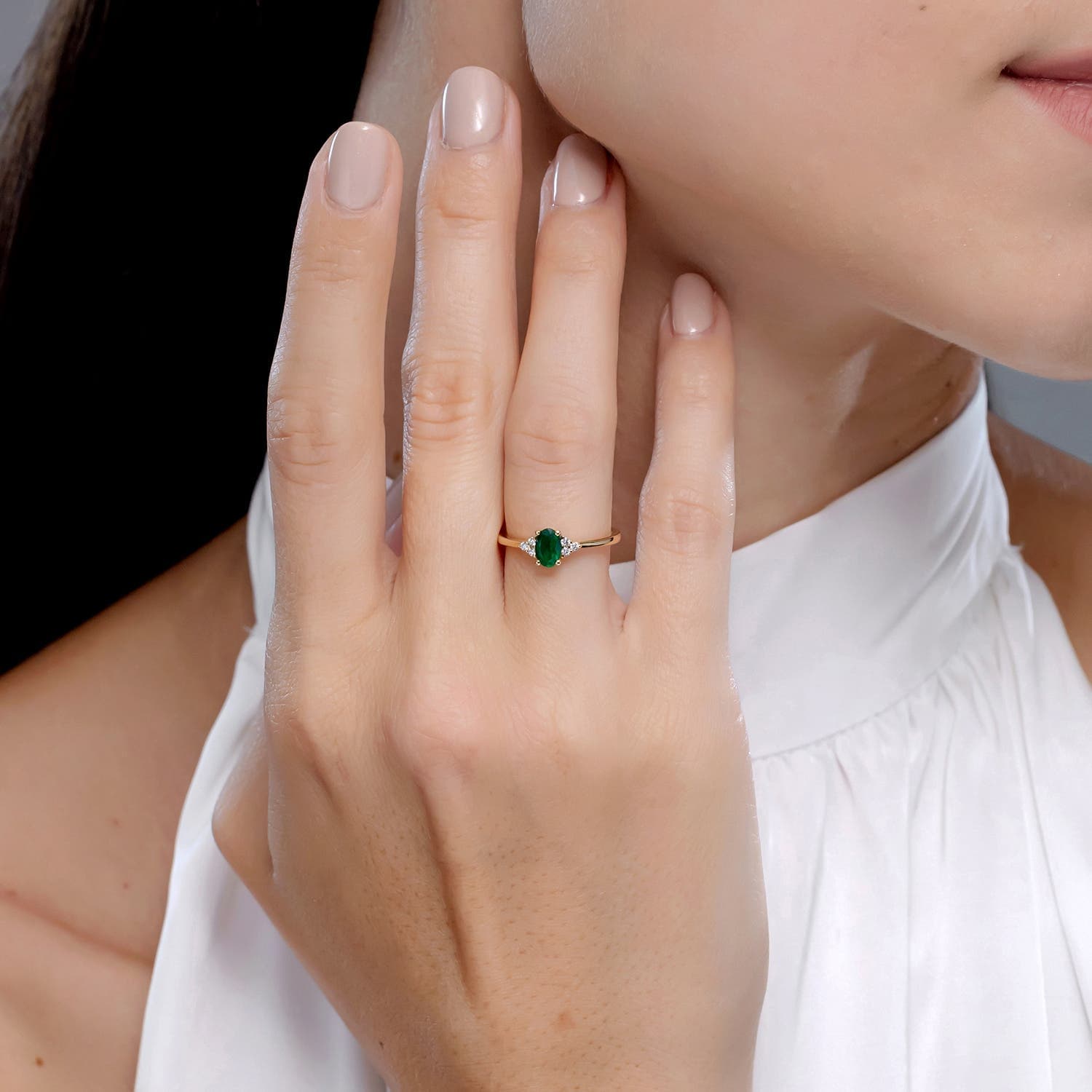 Solitaire Oval Emerald Engagement Ring with Trio Diamond Accents