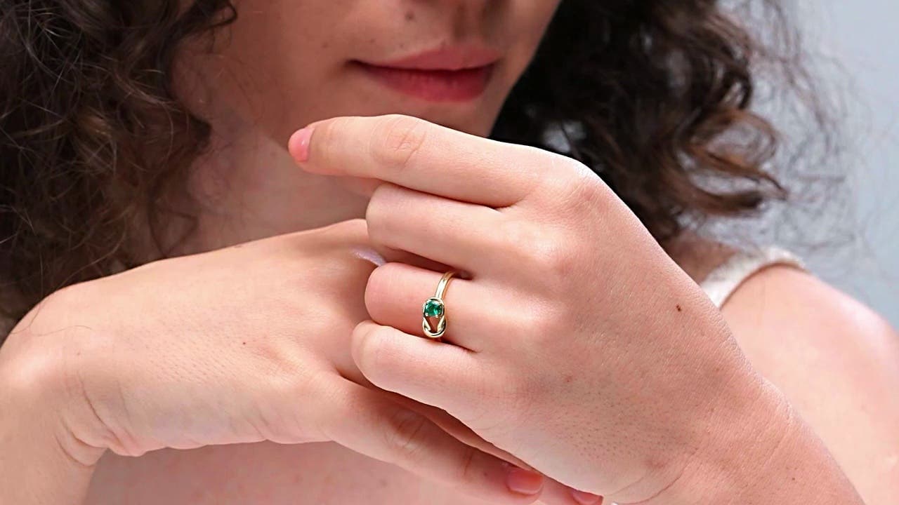 Solitaire Emerald Infinity Knot Engagement Ring