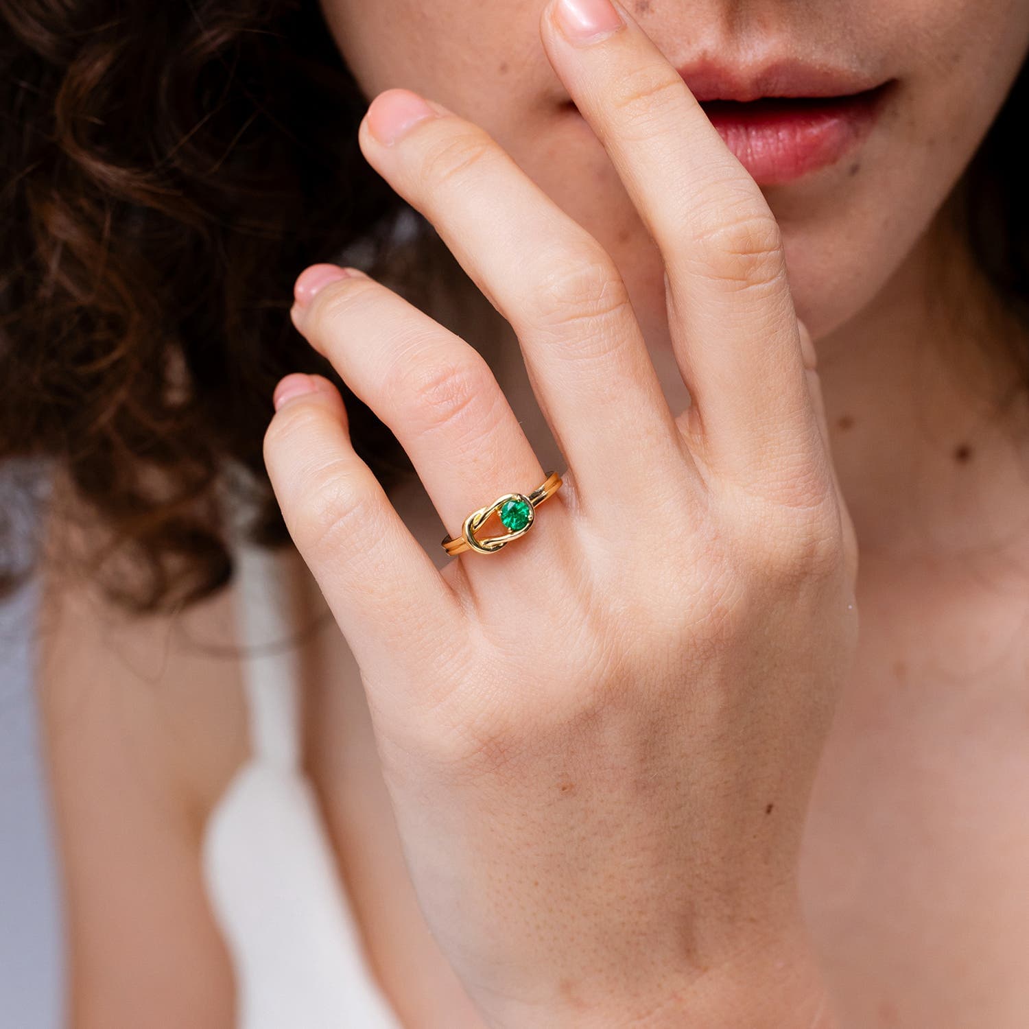 Solitaire Emerald Infinity Knot Engagement Ring