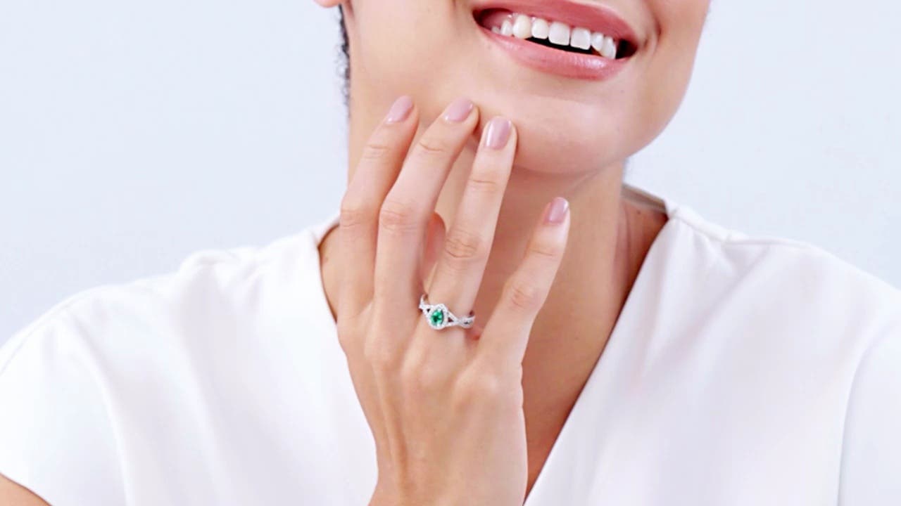 Twist Shank Pear Emerald Engagement Ring with Diamond Halo