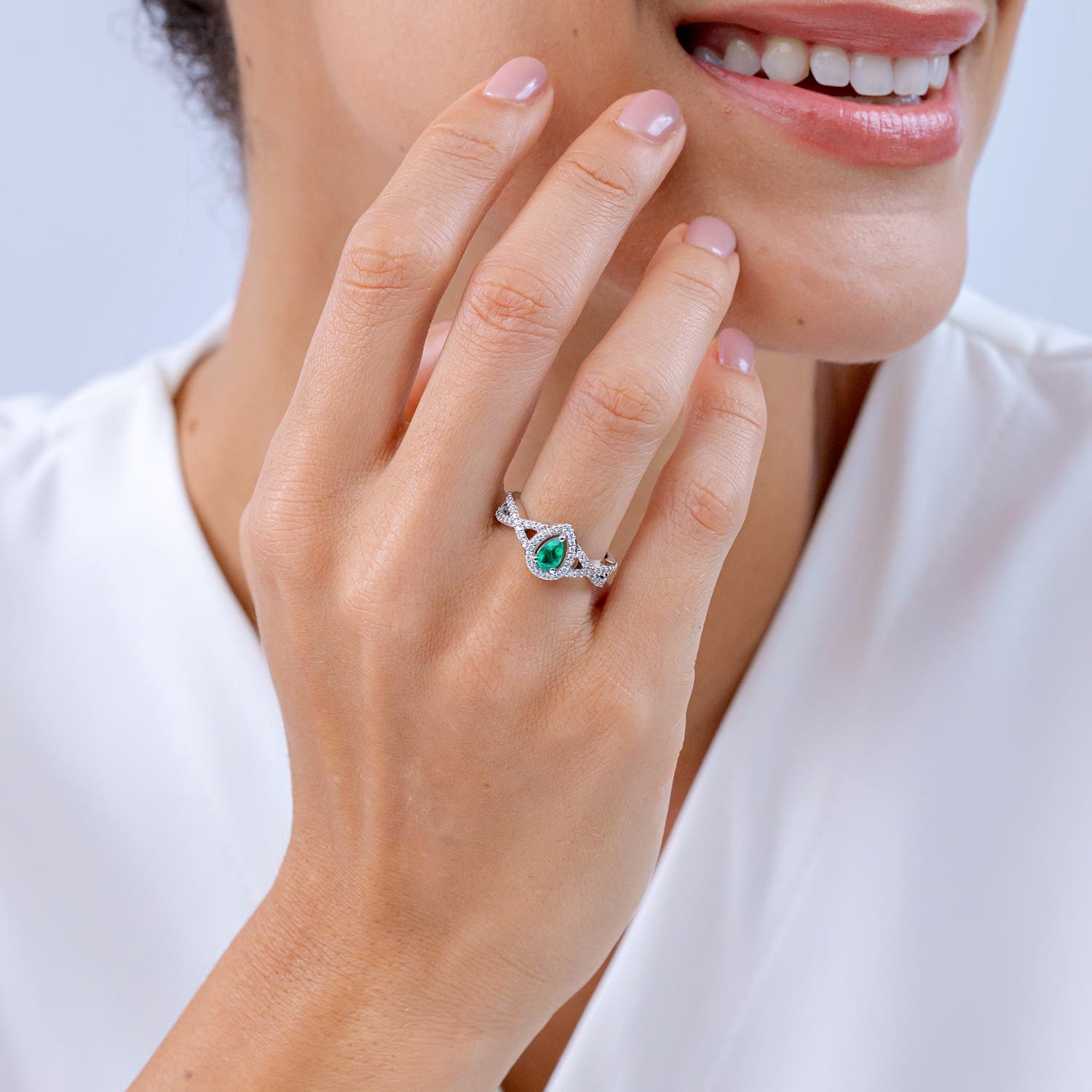 Twist Shank Pear Emerald Engagement Ring with Diamond Halo