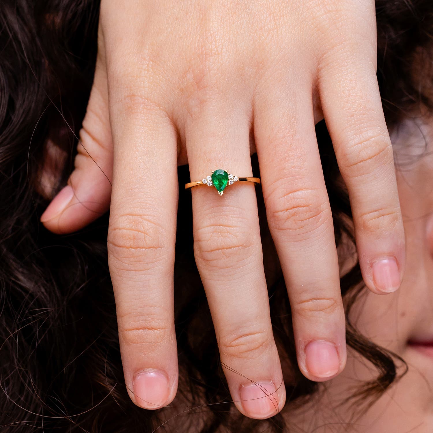 Pear Emerald Solitaire Engagement Ring with Trio Diamond Accents