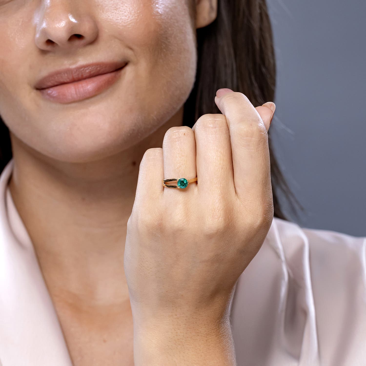 One Sided Split Shank Round Emerald Solitaire Engagement Ring