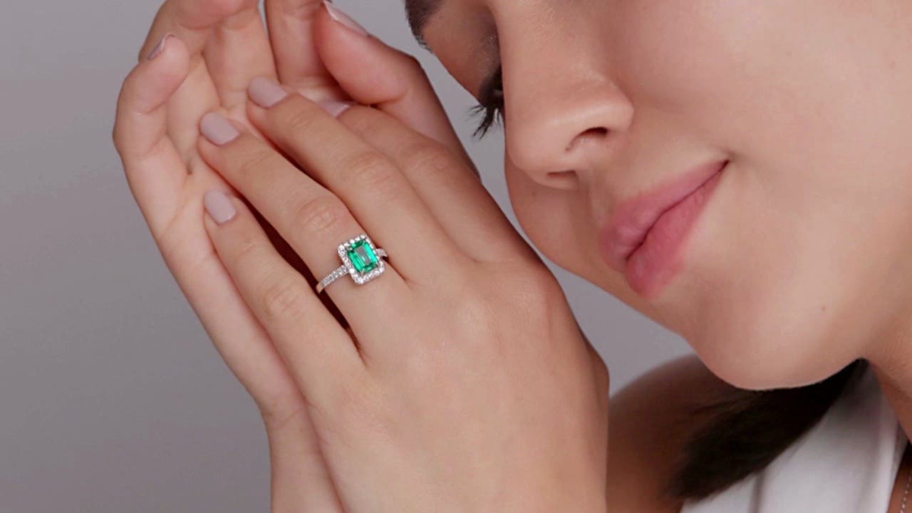 Emerald-Cut Emerald Engagement Ring with Diamond Halo
