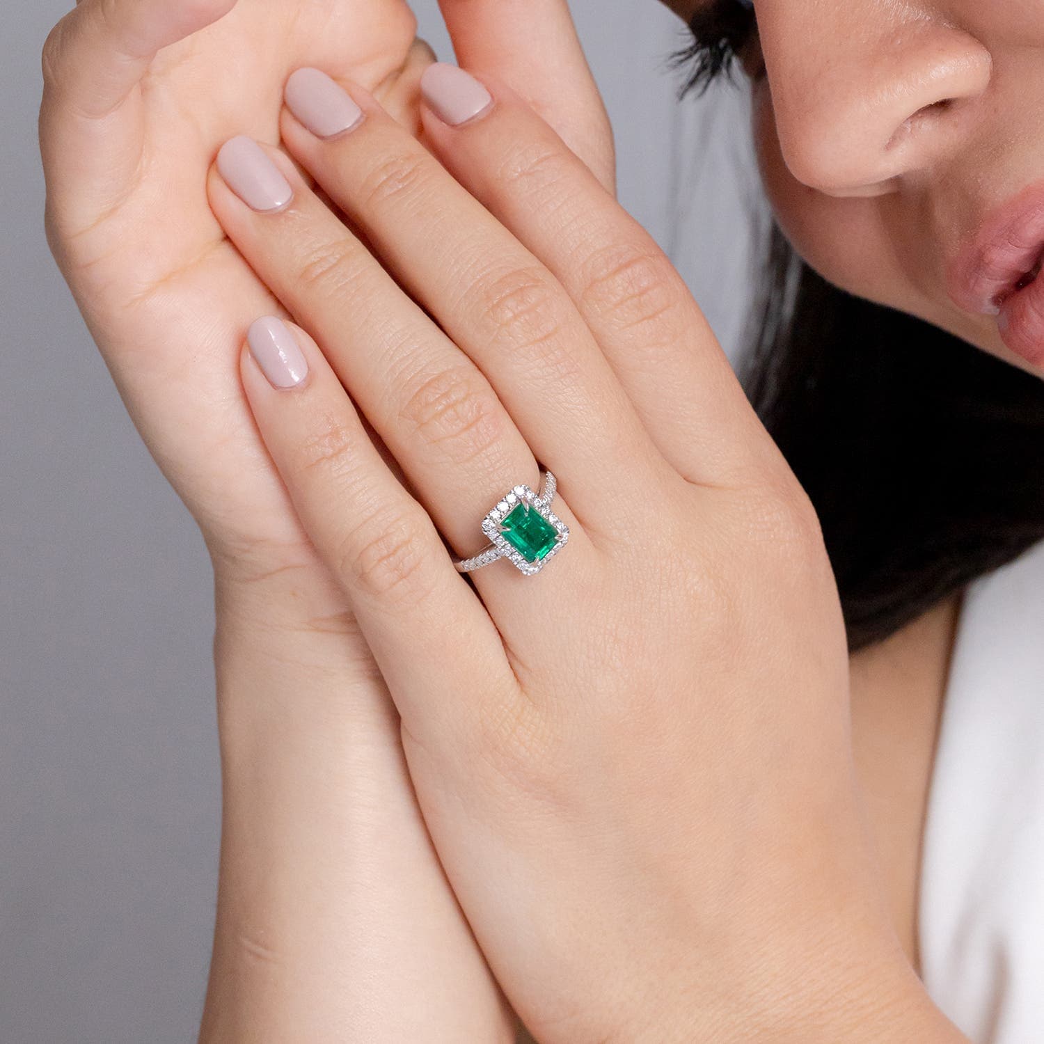 Emerald-Cut Emerald Engagement Ring with Diamond Halo
