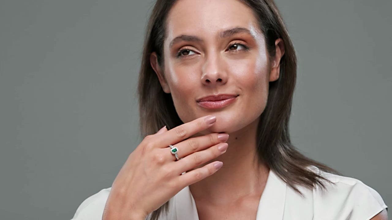 Emerald-Cut Emerald Halo Twisted Shank Engagement Ring