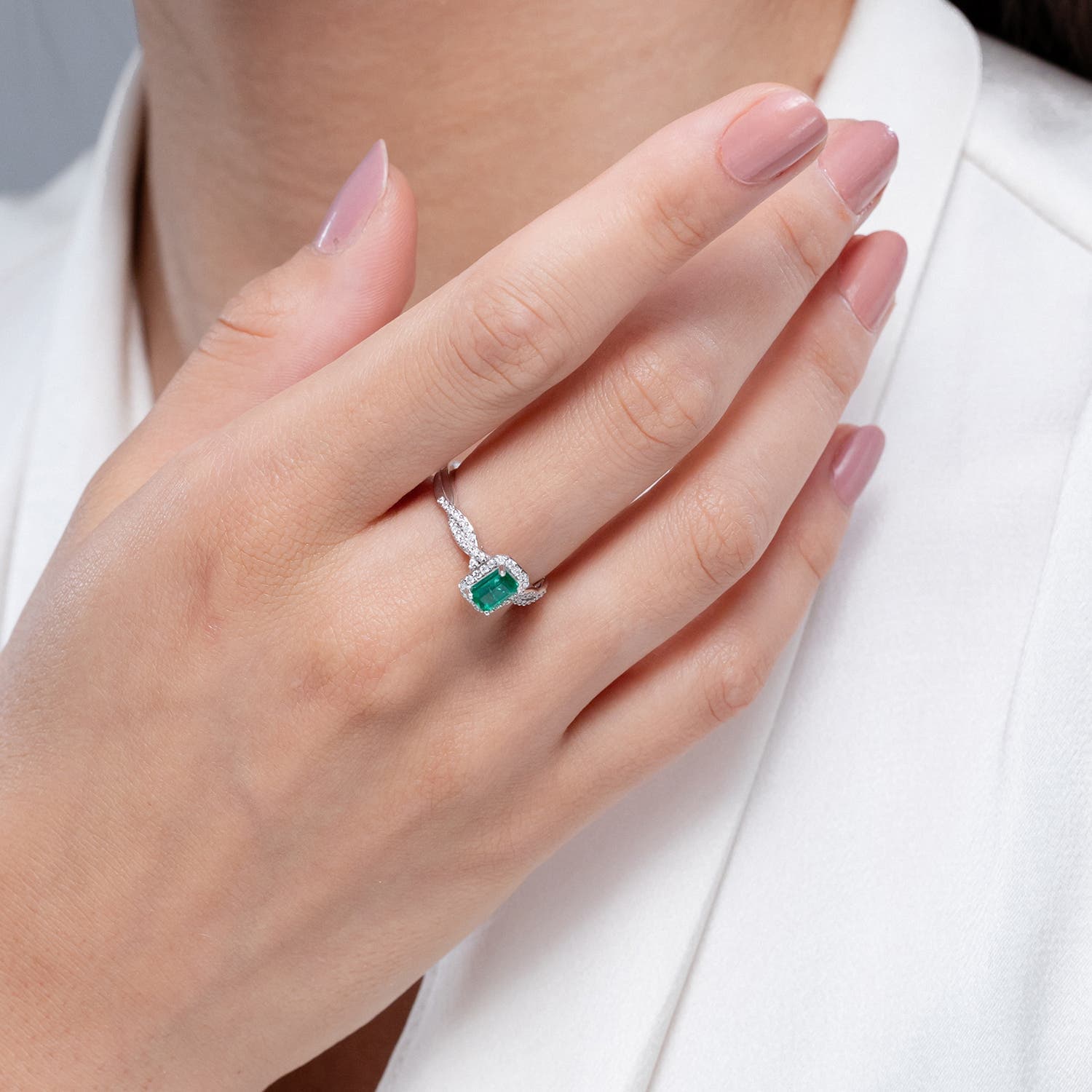 Emerald-Cut Emerald Halo Twisted Shank Engagement Ring