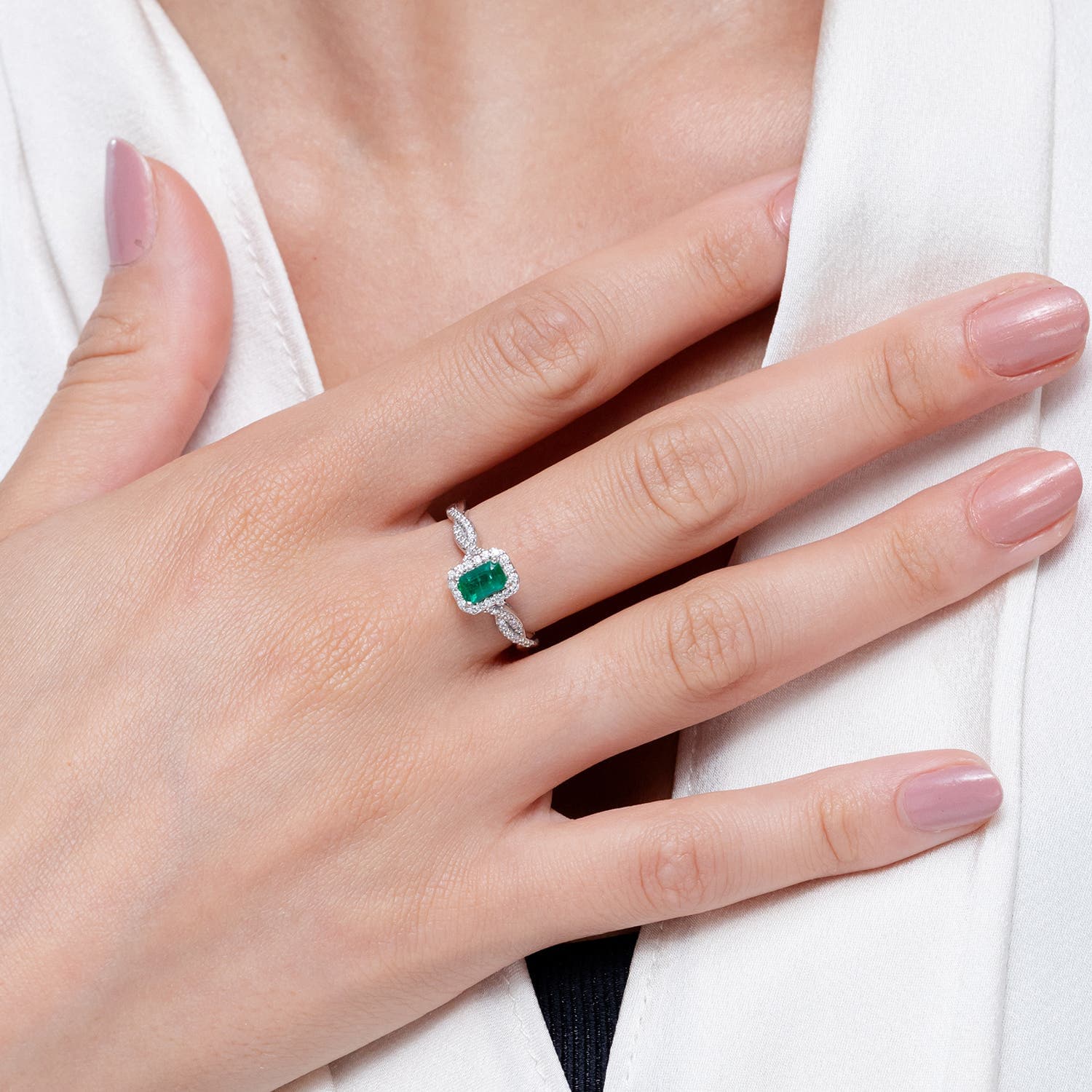 Emerald-Cut Emerald Halo Twisted Shank Engagement Ring