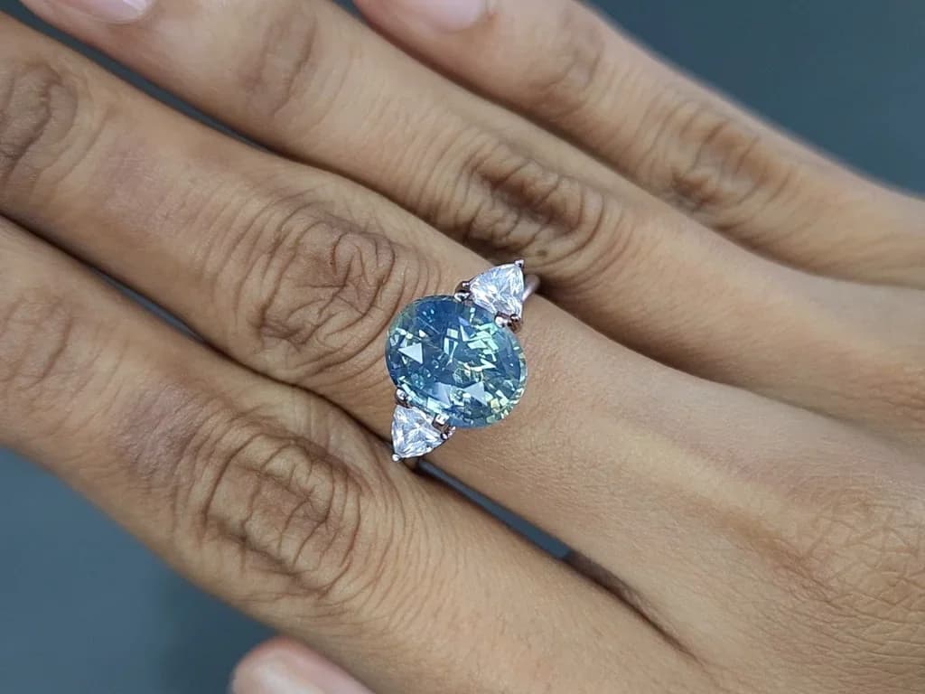 Unheated Teal rutile silk effect sapphire oval cut 5.06 carats, Sri Lanka ID 9845