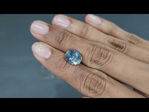 Unheated Teal rutile silk effect sapphire oval cut 5.06 carats, Sri Lanka ID 9845