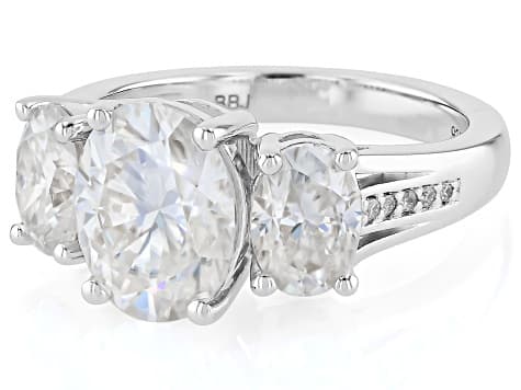 Moissanite Platineve Three Stone Ring 4.90ctw DEW.