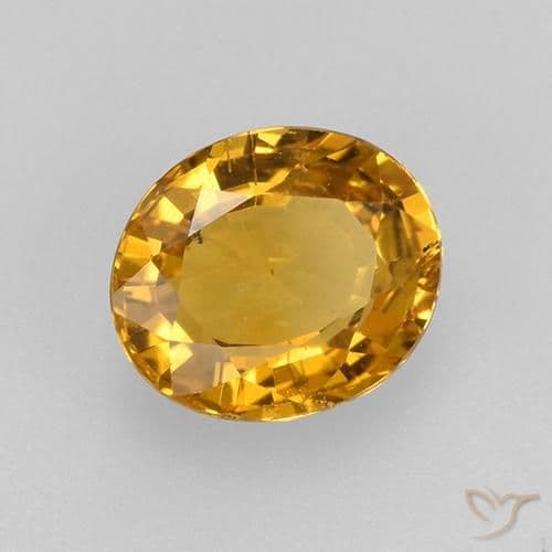 0.77ct Deep Golden Orange Sapphire, Oval Cut, 5.8x4.9 mm