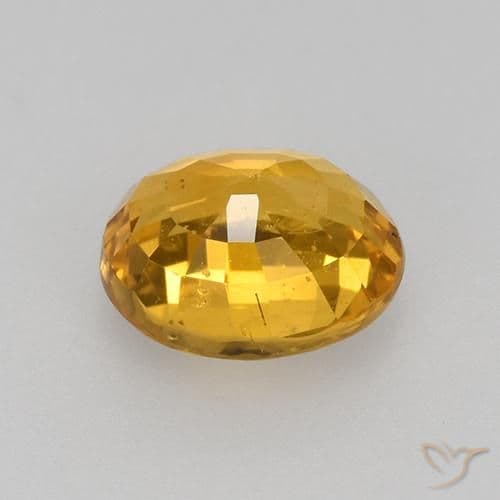 0.77ct Deep Golden Orange Sapphire, Oval Cut, 5.8x4.9 mm
