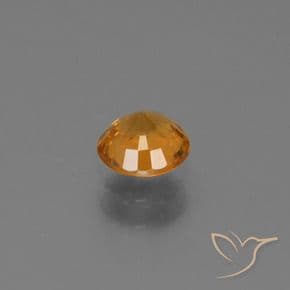 0.67ct Medium-Dark Orange Sapphire, Round Cut, 5.11 mm