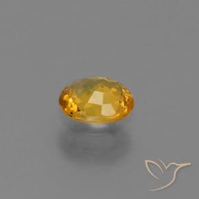 0.73ct Dark Orange-Gold Sapphire, Oval Cut, 6.1x5.2 mm