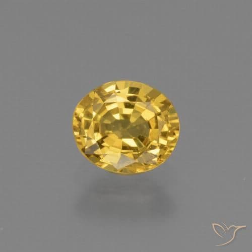 0.61ct Deep Golden Orange Sapphire, Oval Cut, 5.6x4.8 mm