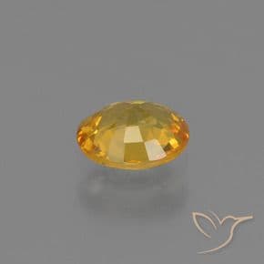 0.64ct Deep Golden Orange Sapphire, Oval Cut, 5.7x4.8 mm