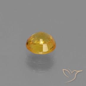 0.73ct Deep Golden Orange Sapphire, Round Cut, 5.09 mm