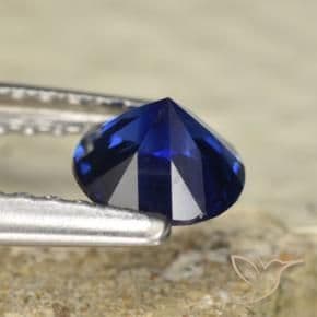 0.60ct Natural Deep Blue Sapphire, Round Cut, 5.08 mm