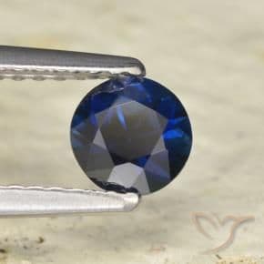 0.54ct Natural Dark Blue Sapphire, Round Cut, 4.94 mm