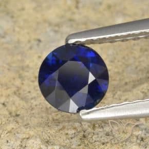 0.60ct Natural Dark Blue Sapphire, Round Cut, 5.02 mm