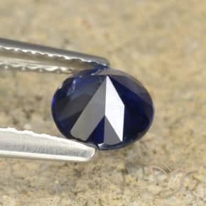0.60ct Natural Dark Blue Sapphire, Round Cut, 5.02 mm