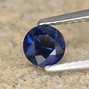 0.60ct Natural Dark Blue Sapphire, Round Cut, 5.05 mm