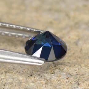 0.60ct Natural Dark Blue Sapphire, Round Cut, 5.05 mm