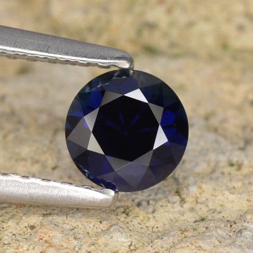 0.63ct Natural Dark Blue Sapphire, Round Cut, 5.13 mm