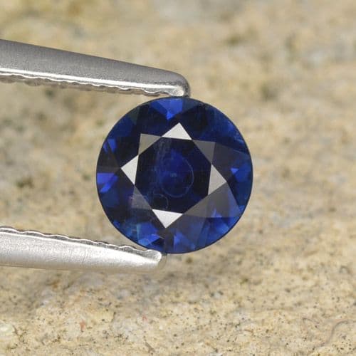 0.57ct Natural Dark Blue Sapphire, Round Cut, 5.03 mm