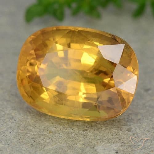 9.36ct Deep Orange-Gold Sapphire, Oval Cut, 13.2x9.9 mm