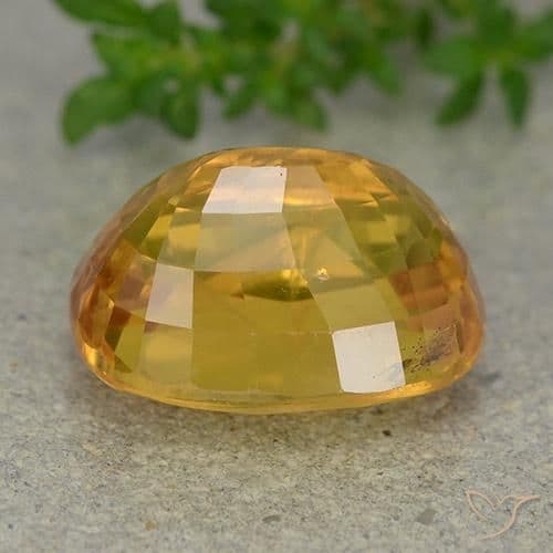 9.36ct Deep Orange-Gold Sapphire, Oval Cut, 13.2x9.9 mm