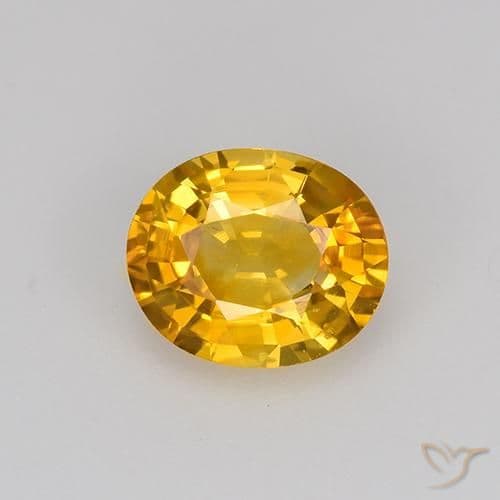 0.84ct Medium Orange-Gold Sapphire, Oval Cut, 6.2x5.2 mm