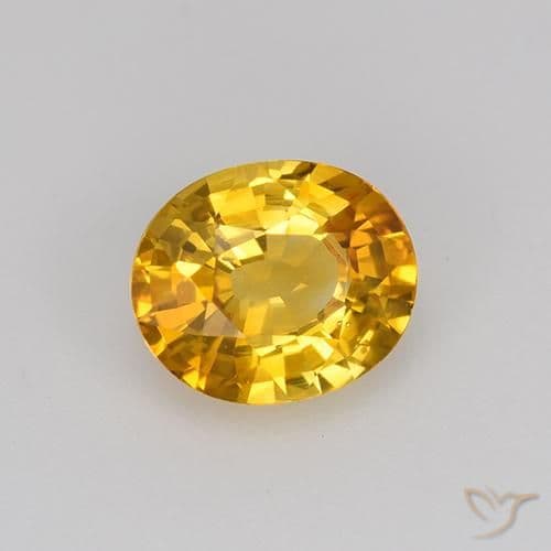 0.84ct Medium Orange-Gold Sapphire, Oval Cut, 6.2x5.2 mm