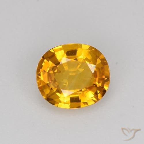 0.75ct Dark Orange-Gold Sapphire, Oval Cut, 5.9x5.2 mm