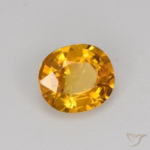 0.75ct Dark Orange-Gold Sapphire, Oval Cut, 5.9x5.2 mm