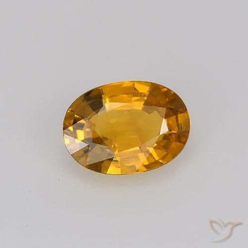 0.71ct Deep Orange-Gold Sapphire, Oval Cut, 6.5x4.7 mm
