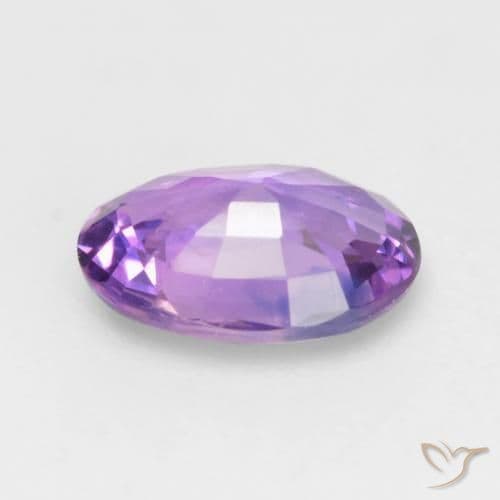0.58ct Medium Pink Violet Sapphire, Oval Cut, 6.2x4.6 mm