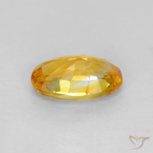 0.72ct Deep Golden Orange Sapphire, Oval Cut, 6.8x4.3 mm