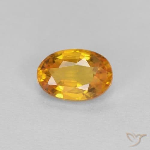 0.56ct Deep Orange-Gold Sapphire, Oval Cut, 5.7x3.9 mm