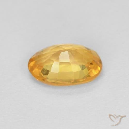 0.56ct Deep Golden Orange Sapphire, Oval Cut, 5.9x4 mm
