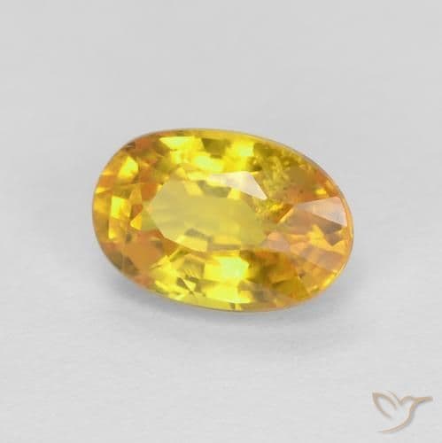 0.75ct Natural Golden Orange Sapphire, Oval Cut, 6.1x4.1 mm
