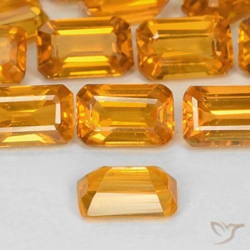0.43ct Deep Orange-Gold Sapphire, Emerald Cut, 5.1x3.2 mm