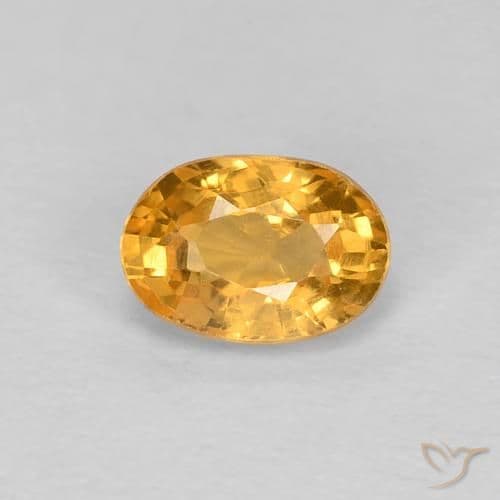 0.65ct Natural Orange-Gold Sapphire, Oval Cut, 5.8x4.1 mm