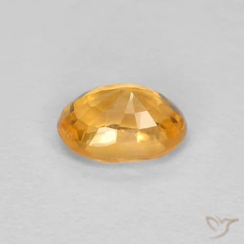 0.65ct Natural Orange-Gold Sapphire, Oval Cut, 5.8x4.1 mm