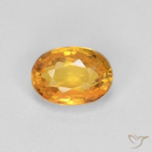 0.65ct Deep Orange-Gold Sapphire, Oval Cut, 5.8x4.2 mm