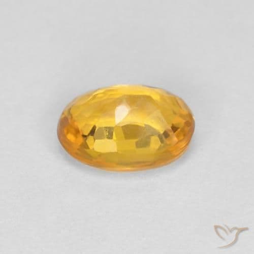 0.65ct Deep Orange-Gold Sapphire, Oval Cut, 5.8x4.2 mm
