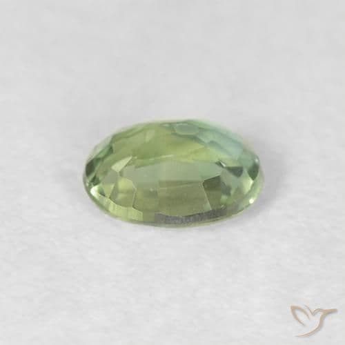 0.30ct Natural Warm Green Sapphire, Oval Cut, 4.4x3.5 mm